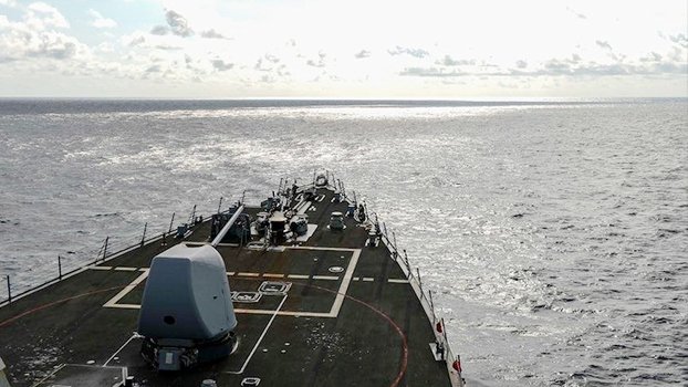 US ship sails in South China Sea by China-claimed islands