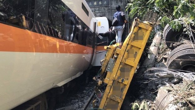 At least 48 dead as Taiwan train derails in tunnel