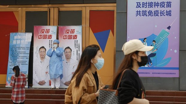 China ramps up vaccination drive with free eggs, other goods