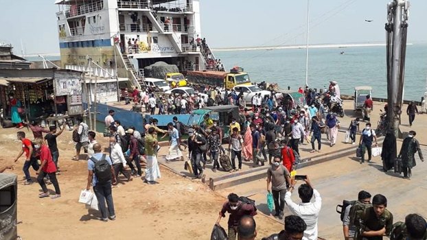 Daulatdia Ferry Ghat overflowing  with people heading home