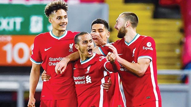 Liverpool sink Saints to keep top-four hopes alive