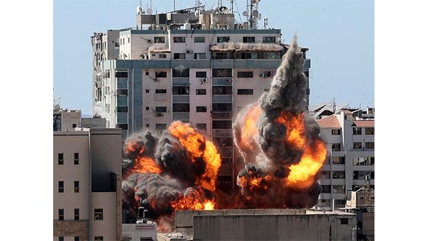 Israel strikes Gaza home of Hamas leader, destroys AP office