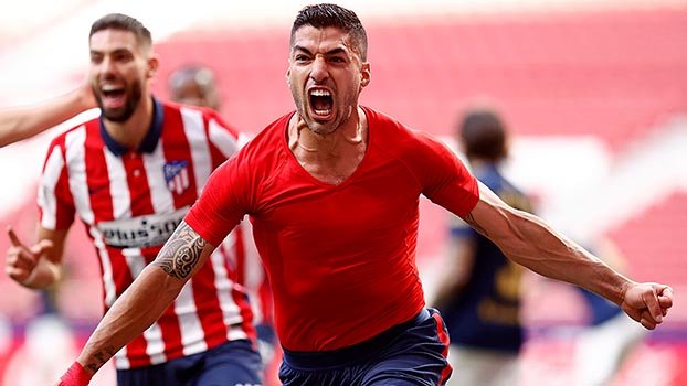 Suarez strike sends Atletico to brink of title