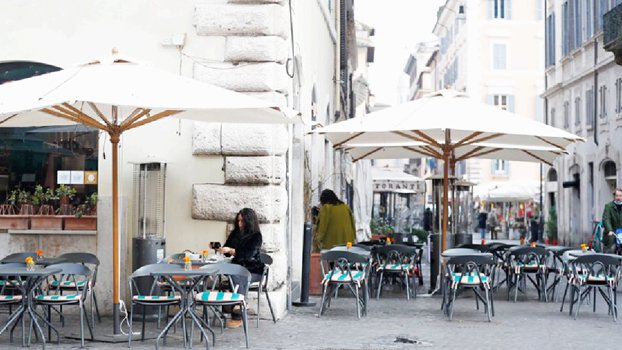 Euro zone business growth hits three-year high on services resurgence