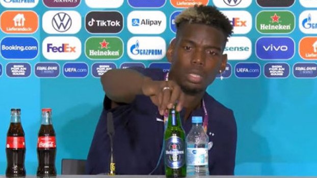Pogba removes Heineken bottle at Euro news conference