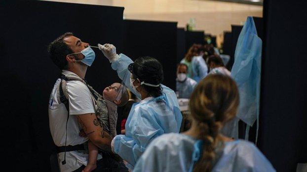 New virus surge sends younger patients to Spain’s hospitals