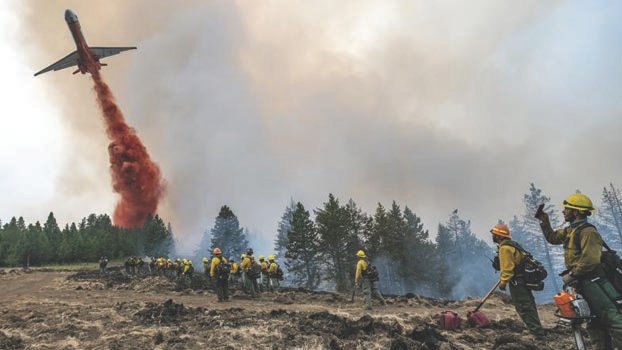 Wildfires threaten homes, land across 10 US states