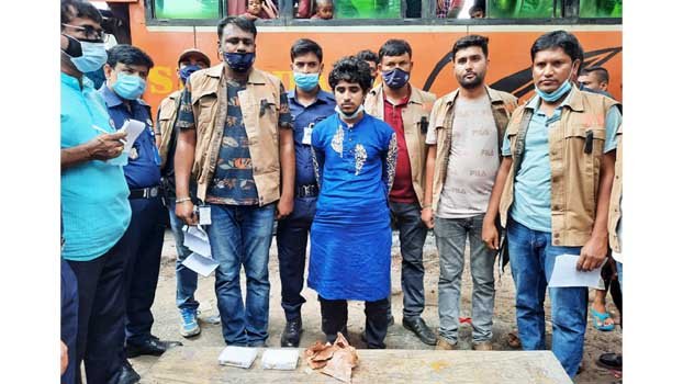 Cumilla smugger held with gold ornaments 