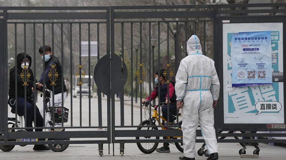 China’s virus cases rise, entry to Shanghai tightened