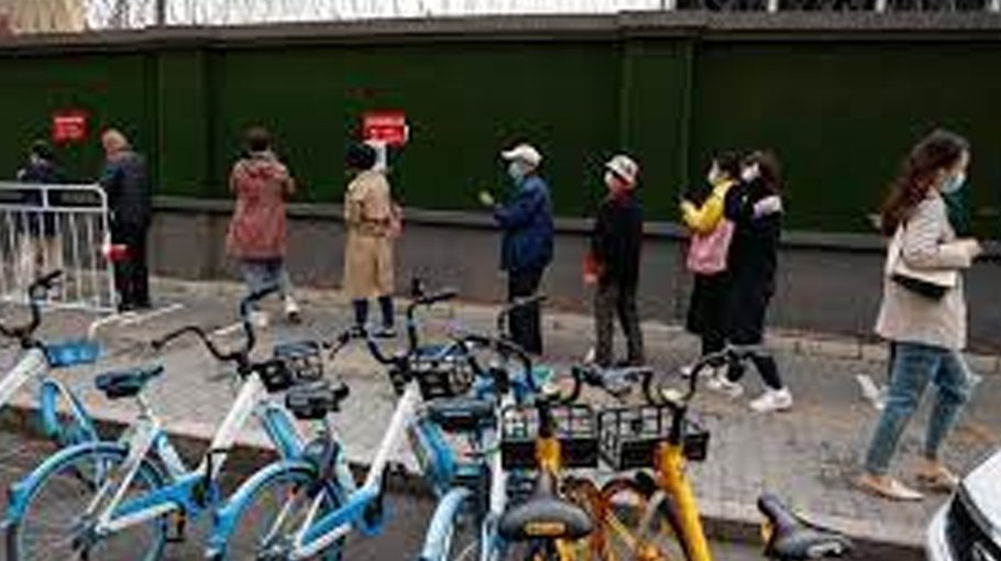 Beijing tightens Covid restrictions as long holiday begins