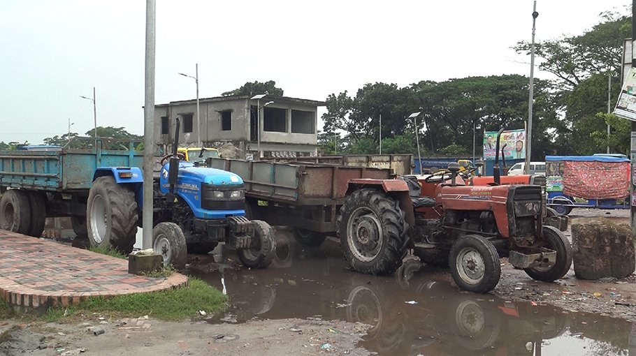 Unlicensed tractors damage roads of Madaripur