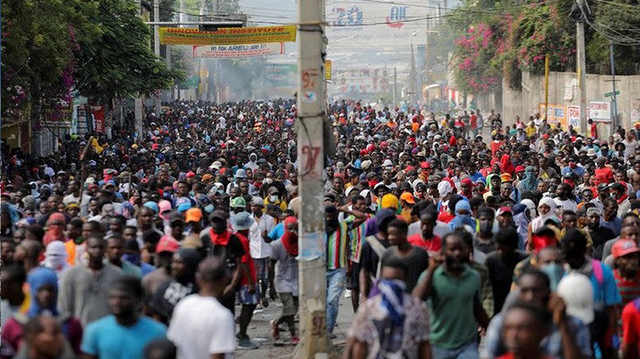 Thousands march in Haiti to protest calls for intervention