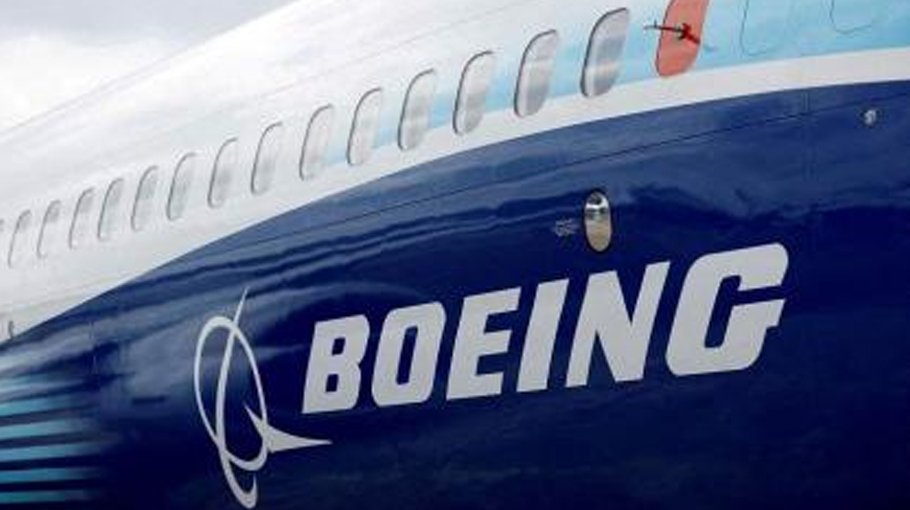 Boeing reports huge loss on defense  contract woes