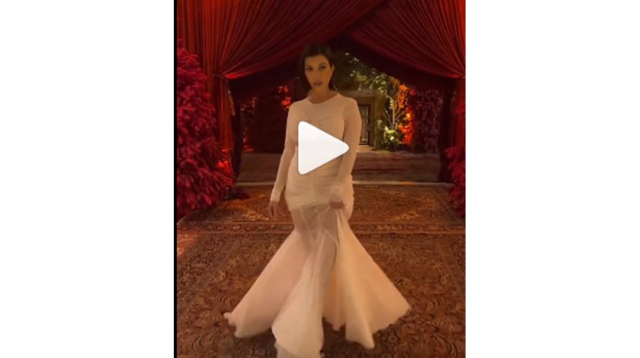 Kourtney is angelic in white gown