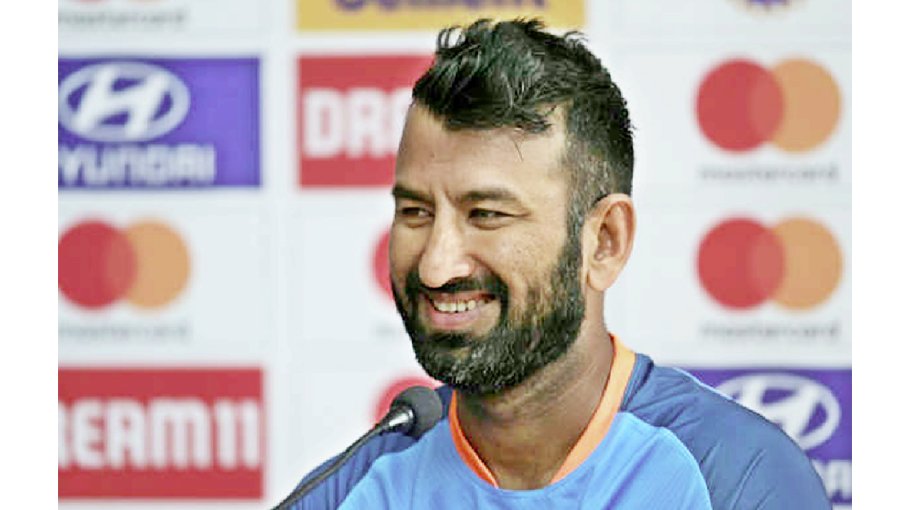 Pujara 'shuts out noise' to reach  Test milestone