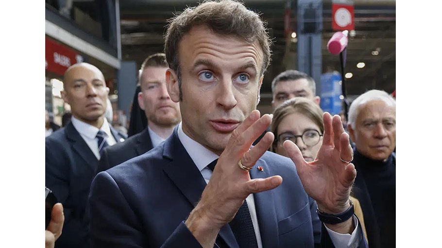 Macron defends contested pension plan at French farm fair