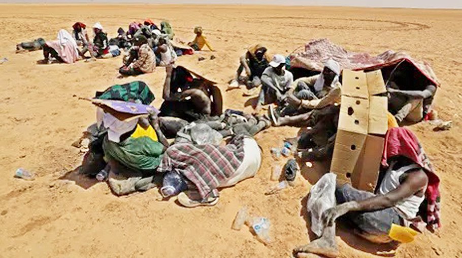 Libya border guards rescue migrants in desert near Tunisia