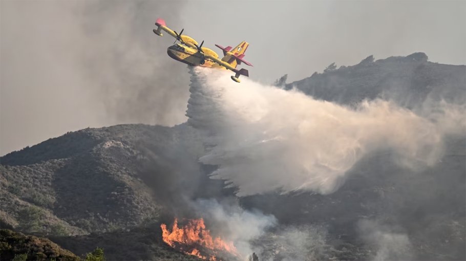 Greece faces new heatwave as   wildfires rage