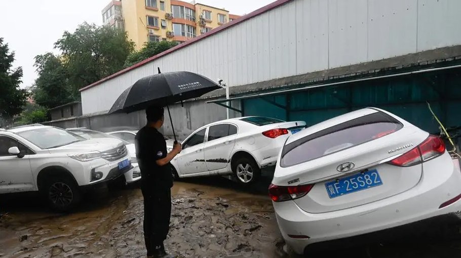 Six dead, four   missing in north China rains