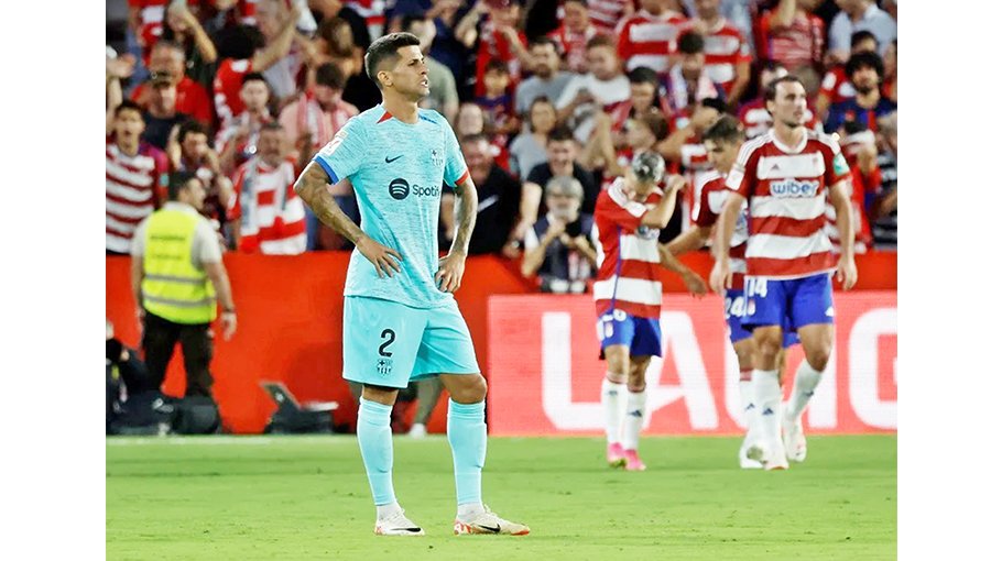 Barca share points Atletico win