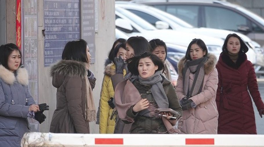 Returning from China, N Korean workers are paid in dubious IOUs