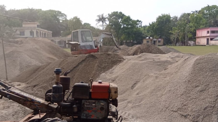 School playground being used for keeping construction materials 
