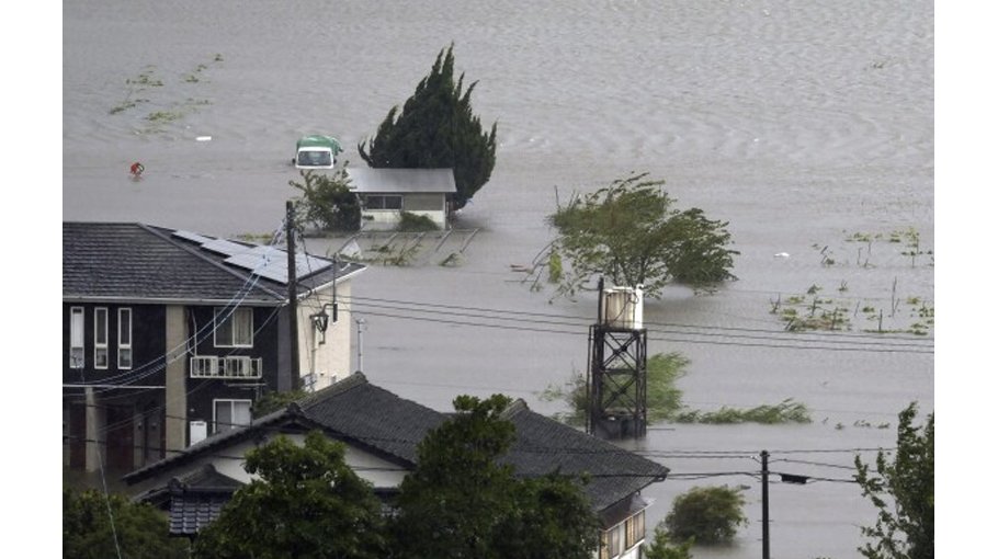 Typhoon lashes Japan with torrential rain, strong winds on a slow crawl north