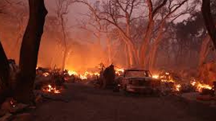 Los Angeles wildfire explodes, engulfing homes