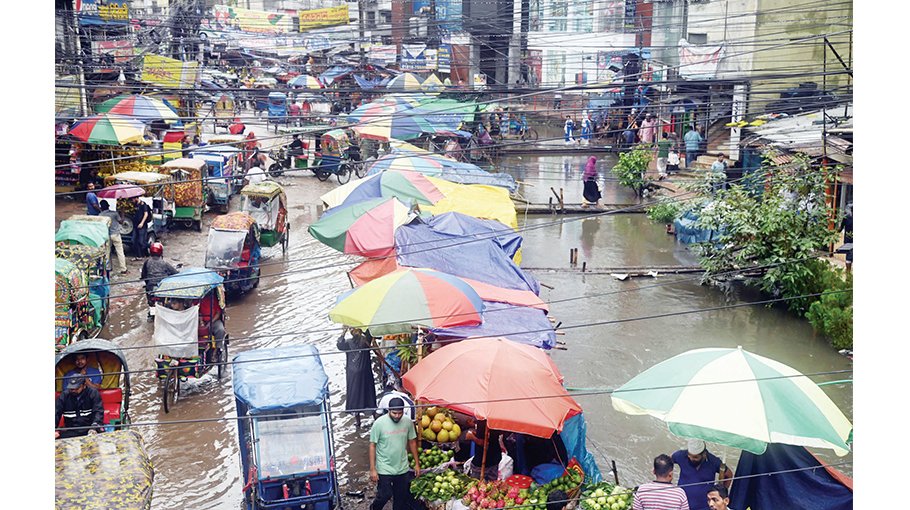 Rain brings relief from heat but batters life in Dhaka 
