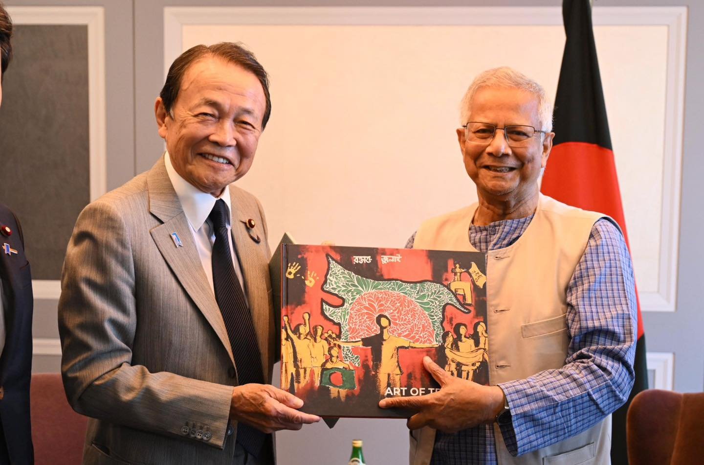 Yunus commences Tokyo tour holding meeting with Taro Aso