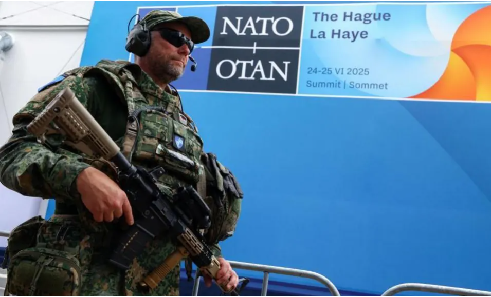 Germany vows fair share of Europe's defence as Nato leaders arrive at Hague summit