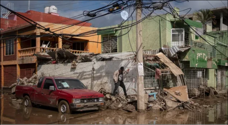 Landslides, floods cut off 300 Mexican communities; dozens dead and missing