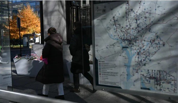 US halts asylum decisions as troop killing sparks migrant crackdown