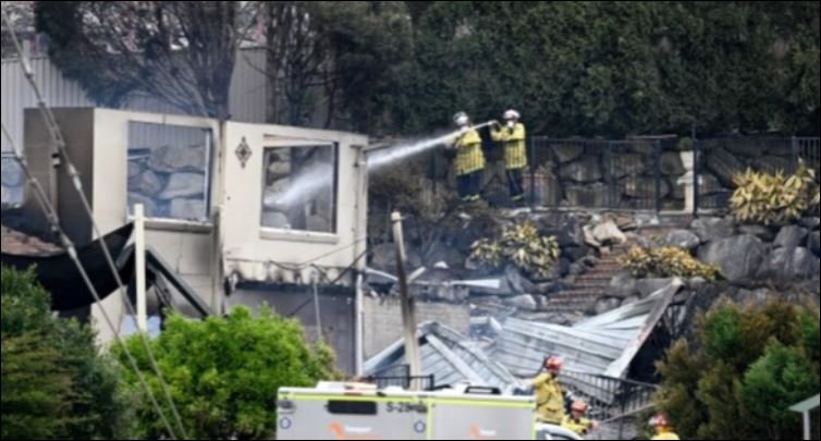Wildfires in Australia destroy 40 homes, claim firefighter’s life