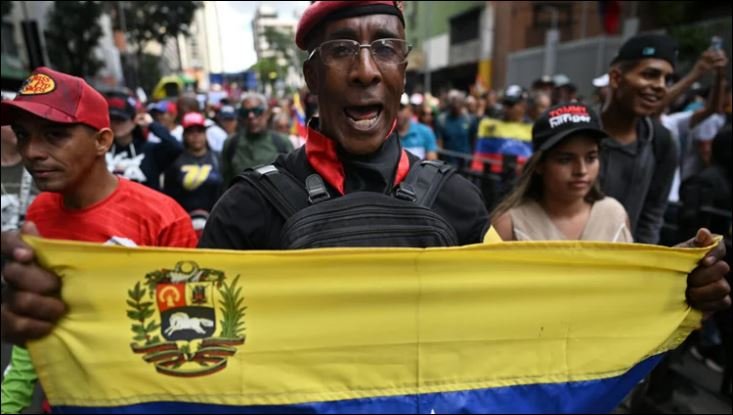 'Free our president', Maduro supporters demand at rally