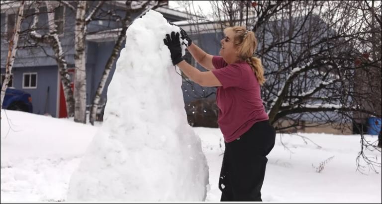 Winter storms dump snow and ice across New England