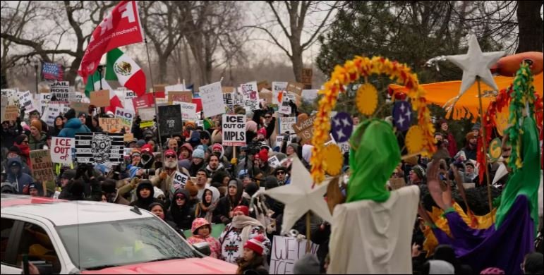 Thousands protest in Minneapolis over fatal ICE shooting, leaders urge peace