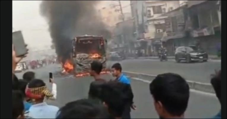 Bus catches fire after collision with motorcycle in Gazipur