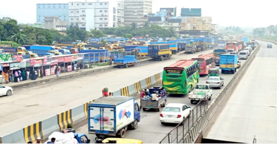 Dhaka-Ctg highway sees long tailback as workers block road demanding dues