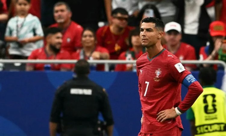 Kane Double Lifts England as Portugal Stumble