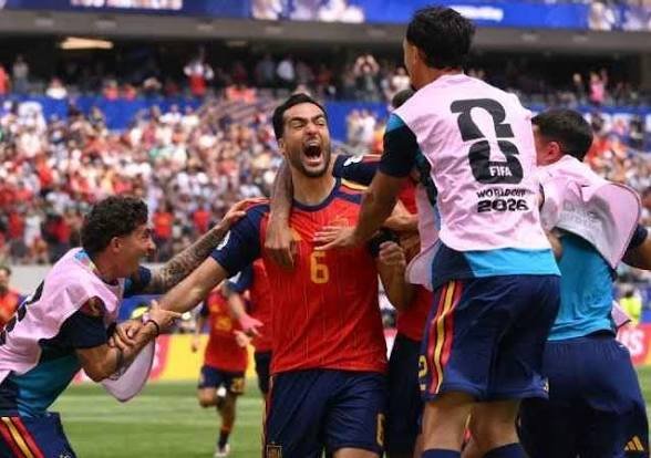 Spain edge Belgium 2-1 as Merino strikes late again